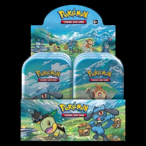 Pokémon Trading Card Game booster box display with three sealed tins featuring mountain landscape art and Pokémon characters